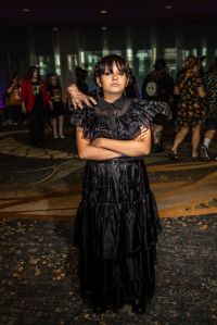 People dressing up in cosplay during Midsummer Scream, a Halloween and horror convention, in Long Beach, CA