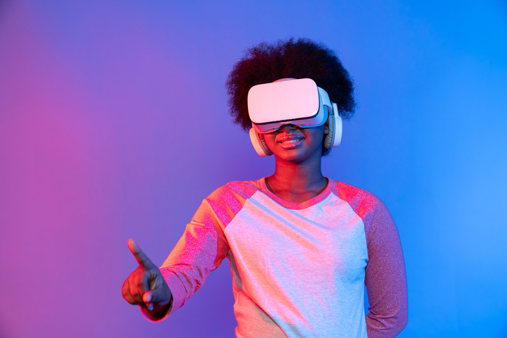 Young African wearing VR through meta select 3D hologram data app. Contrivance.
